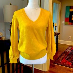 Burnt yellow v-neck sweater with balloon style sleeves